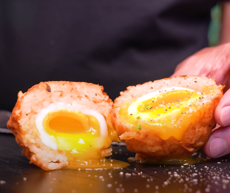 hash brown scotch egg cut in half