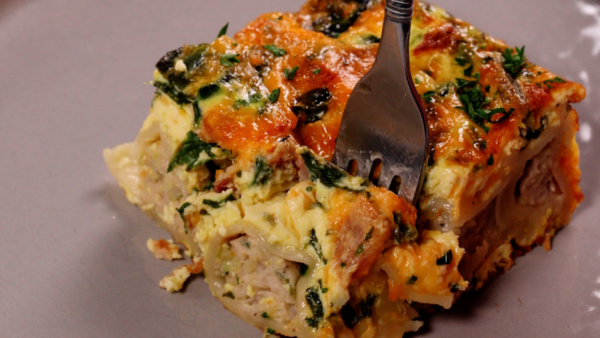 a slice of Potsticker and Spinach Breakfast Strata