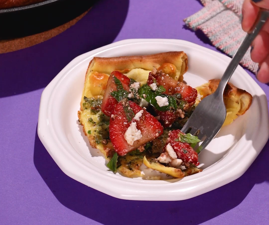 a slice of Strawberry, Feta and Mint Dutch Baby on a plate